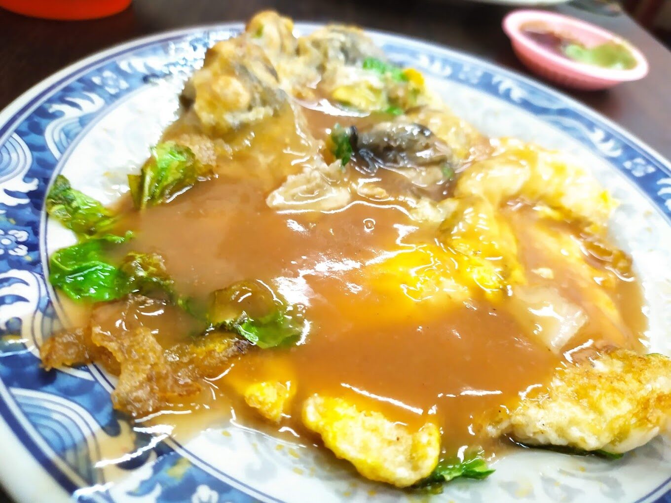 南機場夜市必吃小吃大全:從蚵仔煎到臭豆腐的美味探索