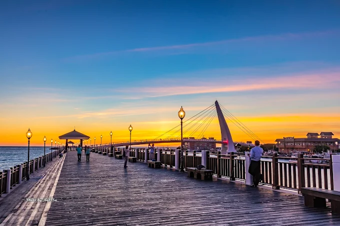 淡水漁人碼頭怎麼玩？情人橋夕陽、夜景美拍與必吃小吃懶人包