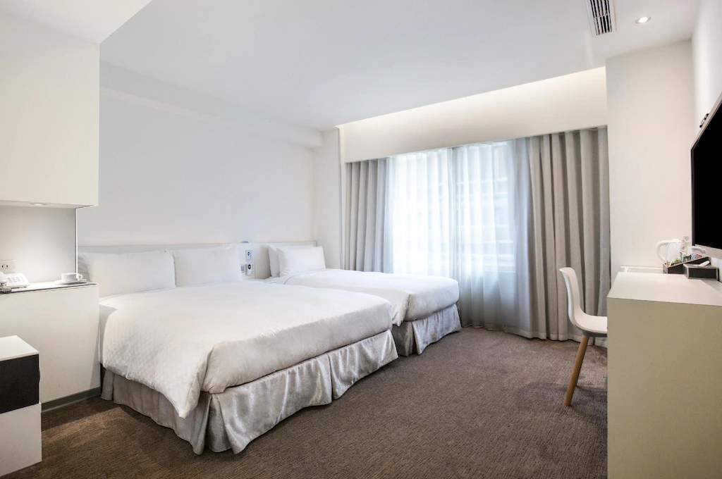 在台北的夜色裡慢步前往入住,於精選酒店中找到屬於旅人的安靜節奏