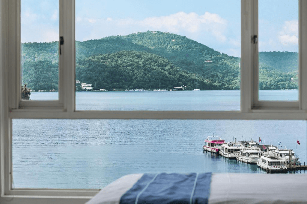 清晨看湖、傍晚等雲，在南投日月潭與清境挑一間願意多住的地方