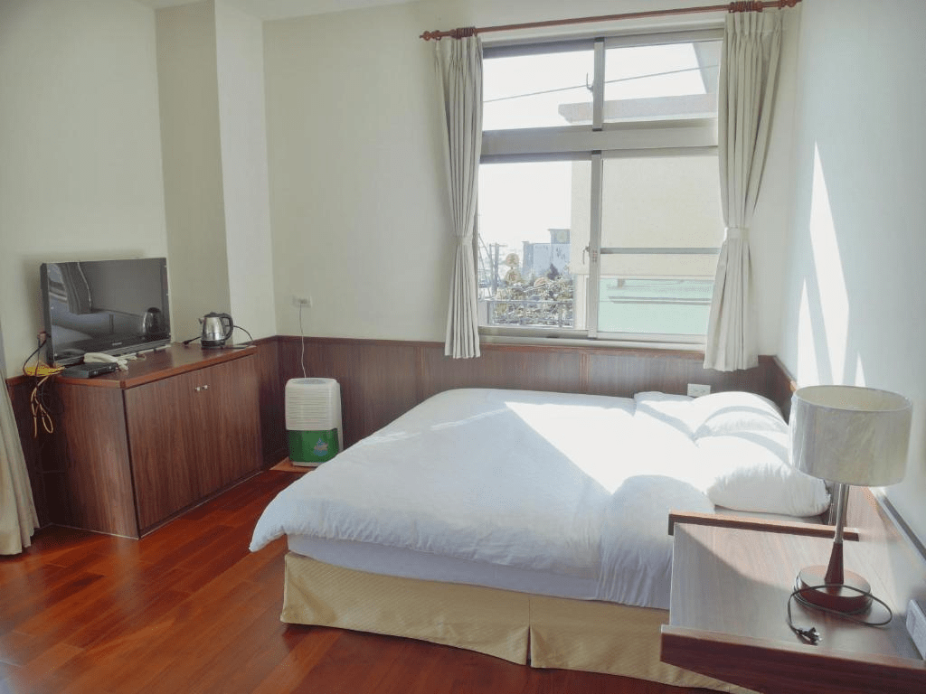 秋冬走上阿里山，在雲海升起的清晨與木屋安靜的夜裡，住一晚剛好的山居節奏