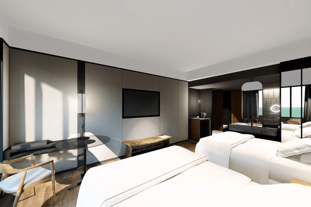 桃園喜來登酒店客房內部，典雅設計與舒適床組