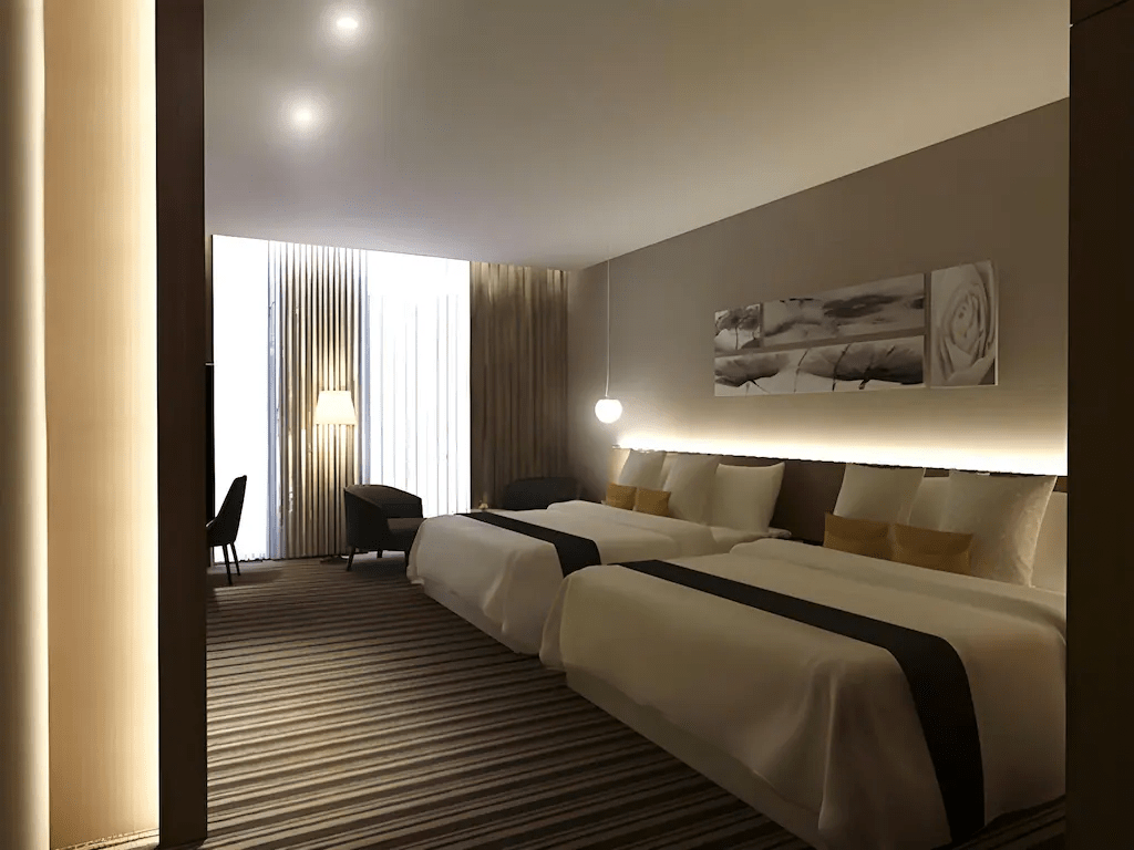 尚順君樂飯店客房設計現代溫馨，營造舒適放鬆的住宿氛圍。