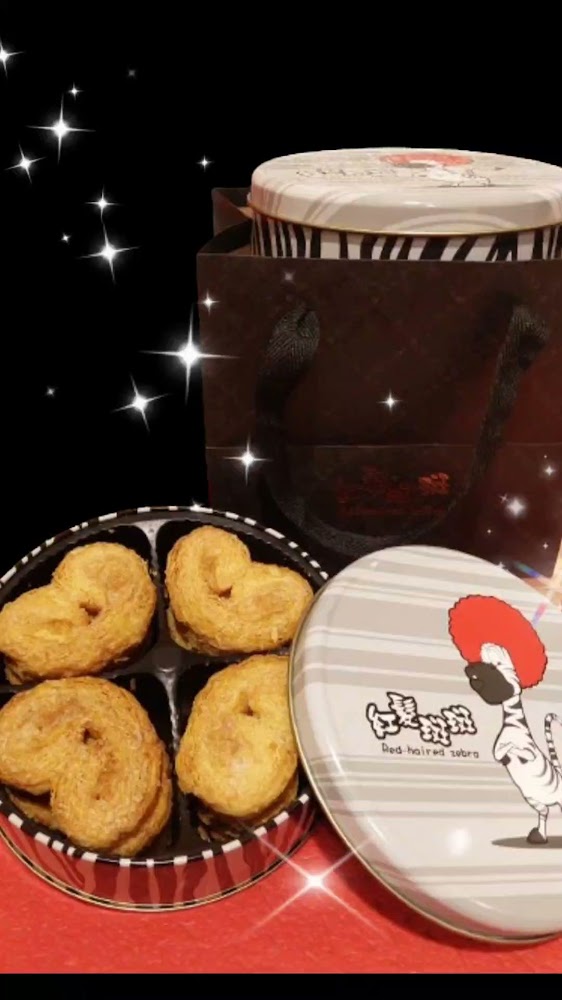 紅髮斑斑鐵盒與心型餅乾包裝