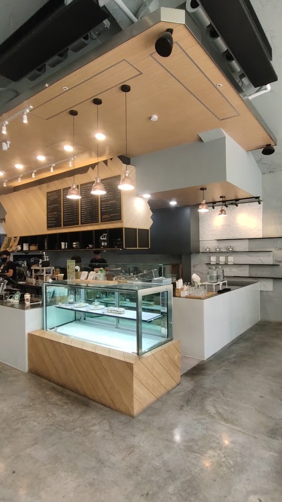 咖啡覺醒美術店甜點櫃與點餐吧台