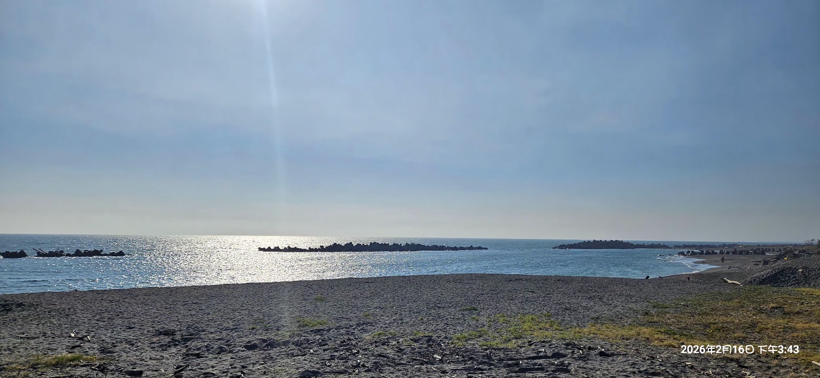 林園海洋濕地公園海灘遠景,藍天陽光,防波堤延伸海面